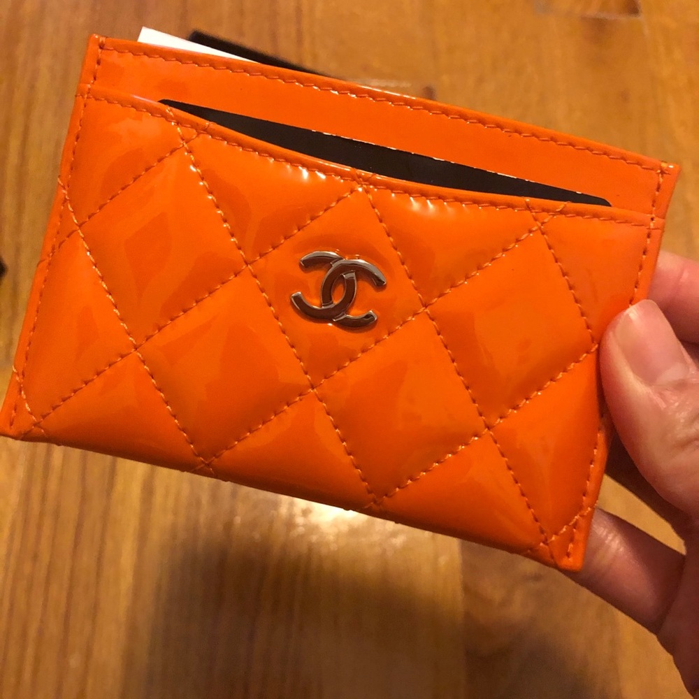 SOLD 100% authentic Chanel orange card holder